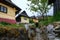 Colorful wooden houses in the village Vlkolinec with a small stream, Slovak Republic, UNESCO. Cultural heritage.