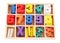 Colorful wooden numbers in box isolated