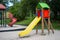 A colorful wooden slide in the park in the children\\\'s playground