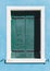 Colorful wooden window in Greece with secret love messages text blue, cyan,