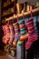 colorful woolen socks hanging by the fireplace