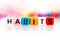 Colorful word cube of habits