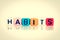 Colorful word cube of habits
