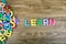 The colorful word `LEARN` next to a pile of other letters