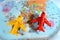 Colorful world map with airplane on it with the continents Africa, Europe, North America, Asia, South America, Australia and