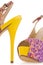 Colorful yellow women stiletto shoes, on white