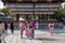 Colorful young japanese girls dressed in traditional kimonos chatting in temple