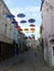 Colorfull street with umbrelas in Caernarfon, UK