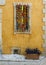 Colorfully decorated metal window grating on a street in the `Violet village`, Tourrettes sur Loup in Provence, France