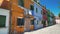 Colorfully painted buildings, street on Burano island, Italian architecture