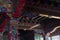 Colorfully painted ceiling and carved columns, ornaments in the Pemayangtse buddhist temple