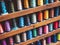Colorfuls Bobbins on shelf Thread Textile Fabric Industrial