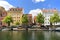 Colorfur houses on the canal in the city, moored boats, Copenhagen, Denmark