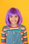 Coloring childs hair great way upgrade costume. Change color. Fantasy hair trend. Kid girl with bright vibrant hairstyle