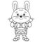 Coloring Page Outline Of cartoon little bunny or hare with toy drum. Coloring Book for kids