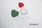 Colors of the hungarian flag French Raspberry, White, Amazon/green painted on three hearts.