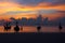 The colors of the sky and sea, the tranquil Twilight and the boat parked by the sea.