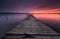 Colors of sunset and the old rusty pier