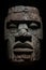 Colossal Olmec Head stone statue. In the forest. Central and south american forest. Rain forest.