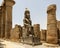 Colossal statue seated King at the entrance to the Colonnade Hall from the Rameses II Court of the Luxor Temple. the Luxor Temple.