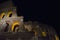 Colosseum - amphitheater, an architectural monument of Ancient Rome. View of the Colosseum in the evening.