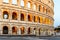 Colosseum, or Coliseum. Illuminated huge Roman amphitheatre early in the morning, Rome, Italy