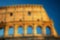 Colosseum Coliseum at sunset as blur background, Rome, Italy