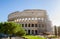 Colosseum exterior with scaffolding on a sunny autumn day