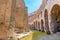 Colosseum interior passage on sunny day.