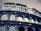Colosseum in Rome, Italy in black and white; dramatic, retro style