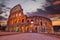 Colosseum at sunset, Rome. Rome best known architecture and landmark. Rome Colosseum is one of the main attractions of Rome and