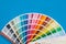 Colour palette sampler, isolated on blue background