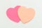 Colour  paper heart stick note on a white background