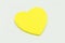 Colour  paper heart stick note on a white background