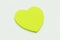 Colour  paper heart stick note on a white background