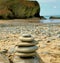 Colour stacking stones on the beach