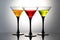 Coloured drinks in martini glasses, cocktails with liqueurs