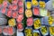 Coloured rose blossoms in flower market in India