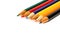 Coloured small pencils in colours green, red, blue, yellow, orange and black isolated on a seamless white background