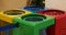 Coloured waste containers to indicate the different types of recycling materials, depending on the type of waste and in yellow,