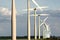 Coloured wind turbines in a row