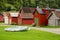 Coloured wooden buildings and the boat