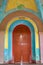 Colourful arched spanish door