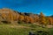 Colourful autumn view overlooking the Passo Fedaia pass near the Marmolada massif