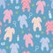 Colourful baby rompers on blue background. Seamless pattern.