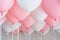 Colourful balloons, pink, white, streamers. Helium Ballon floating in birthday party. Concept balloon of love and