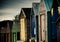 Colourful beach huts with dramatic sky