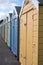 Colourful beach huts located on the promenade on the Bournemouth UK sea front.