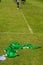 Colourful bibs left on a football pitch.