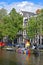 Colourful boat docked at Amsterdam canal